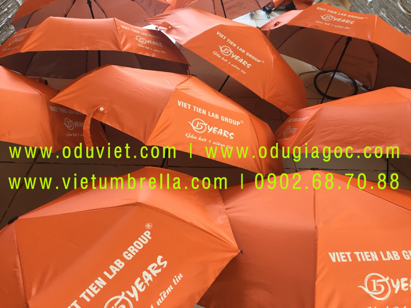 xưởng sản xuất ô dù cầm tay in logo quảng cáo
